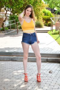 Hazel Moore Heads Inside And Puts A Glass Dildo In Her Ass!