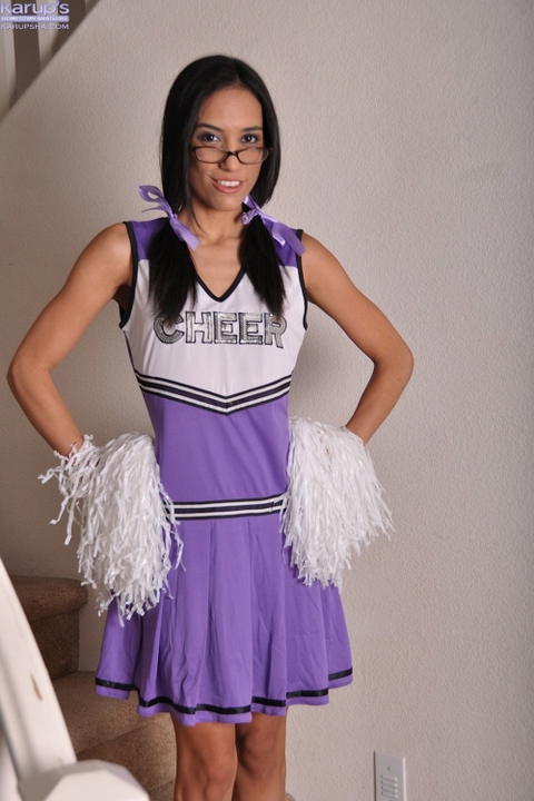 Tia Cyrus - Tia Cyrus Takes Off Her Cheerleader Uniform! - photo 1 of 18