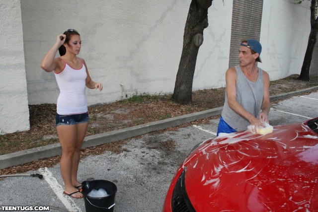 Ashley Storm Washing A Car And Tugging On A Cock!