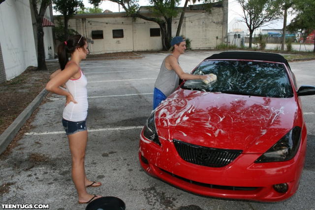 Ashley Storm Washing A Car And Tugging On A Cock!